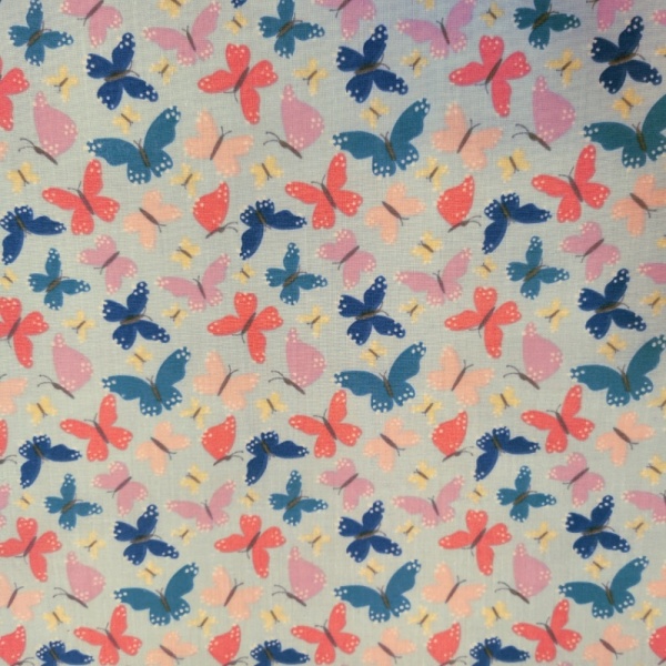 Butterflies Polycotton on Sky Blue